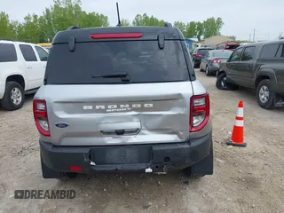 2021 Ford Bronco Sport Badlands z VIN 3FMCR9D99MRA67830, wystawiony jako IAAI lot #42318934 z przebiegiem 129 598 mil mil oraz . Historia ofert i sprzedaży dostępna na DreamBid. Obrazek 6.