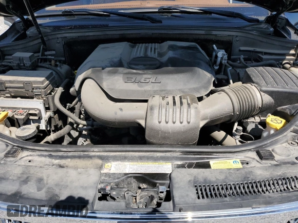 2011 Jeep Grand Cherokee Overland with VIN 1J4RR6GG7BC621024, listed as a Copart auction lot 64103204 with 79,935 mi miles and Salvage title. Bid and sale history available at DreamBid. Image 11.