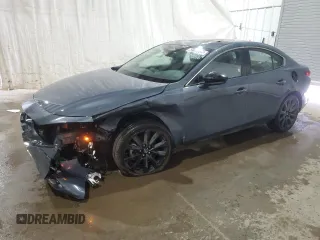 2024 Mazda 3 S Carbon Edition z VIN 3MZBPBCM7RM411319, wystawiony jako Copart lot #62766705 z przebiegiem 30 500 mil mil oraz Nie do naprawy • Non repairable. Historia ofert i sprzedaży dostępna na DreamBid. Obrazek 1.