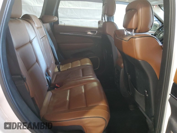2015 Jeep Grand Cherokee Summit with VIN 1C4RJFJG1FC226591, listed as a Copart auction lot 52926115 with 130,803 mi miles and Salvage Title. Bid and sale history available at DreamBid. Image 11.