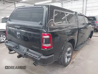 2020 Ram 1500 Big Horn with VIN 1C6SRFFT8LN308129, listed as a IAAI auction lot 42206066 with 38,394 mi miles and . Bid and sale history available at DreamBid. Image 4.
