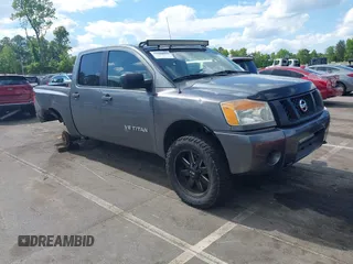 2013 Nissan Titan S with VIN 1N6AA0EJ8DN306646, listed as a IAAI auction lot 42190033 with 147,839 mi miles and . Bid and sale history available at DreamBid. Image 1.