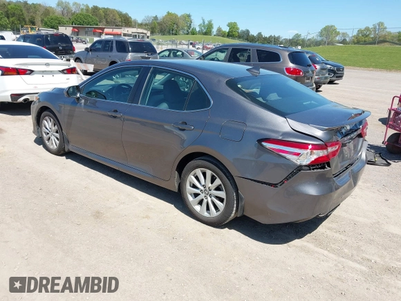 2019 Toyota Camry LE with VIN 4T1B11HK8KU289721, listed as a IAAI auction lot 42021107 with 69,828 mi miles and . Bid and sale history available at DreamBid. Image 3.