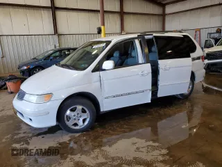 2001 Honda Odyssey EX z VIN 2HKRL18691H586909, wystawiony jako Copart lot #57452415 z przebiegiem 146 731 mil mil oraz Szkoda całkowita • Salvage title. Historia ofert i sprzedaży dostępna na DreamBid. Obrazek 1.