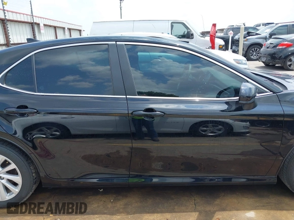2023 Toyota Camry LE z VIN 4T1C11AK3PU182887, wystawiony jako IAAI lot #42156807 z przebiegiem 33 019 mil mil oraz . Historia ofert i sprzedaży dostępna na DreamBid. Obrazek 13.