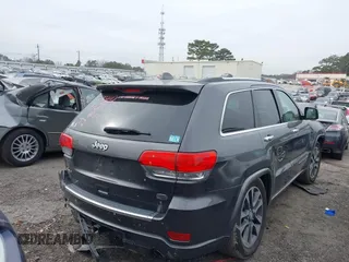 2017 Jeep Grand Cherokee Overland with VIN 1C4RJFCG8HC772837, listed as a IAAI auction lot 41304895 with 71,338 mi miles. Bid and sale history available at carsss.com. Image 4.