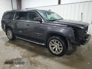 2016 GMC Yukon XL SLE with VIN 1GKS2FKC5GR335830, listed as a Copart auction lot 71294384 with 85,092 mi miles and Salvage Title. Bid and sale history available at carsss.com. Image 4.