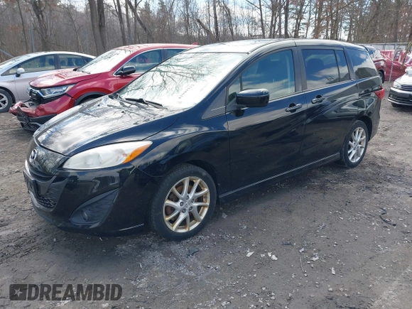 2012 Mazda 5 Touring with VIN JM1CW2CL8C0111574, listed as a IAAI auction lot 41999112 with 126,963 mi miles and . Bid and sale history available at DreamBid. Image 2.