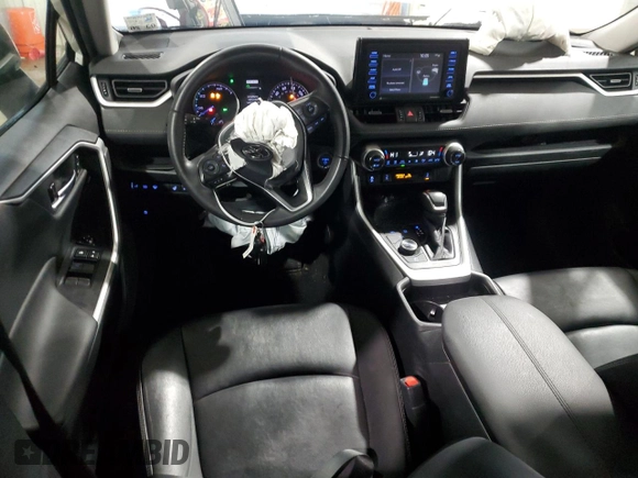 2021 Toyota RAV4 Hybrid LE with VIN 4T3B6RFV0MU050204, listed as a Copart auction lot 50768195 with 76,508 mi miles and Salvage Title. Bid and sale history available at carsss.com. Image 8.