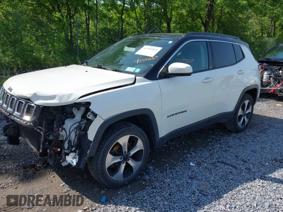 2018 Jeep Compass Latitude z VIN 3C4NJDBB2JT281182, wystawiony jako IAAI lot #42392069 z przebiegiem 112 758 mil mil oraz . Historia ofert i sprzedaży dostępna na DreamBid. Obrazek 2.