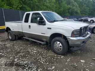 2004 Ford F-350 XL with VIN 1FTWX33P64EC85537, listed as a Copart auction lot 54480415 with Not provided miles and Salvage title. Bid and sale history available at DreamBid. Image 4.