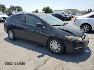 2010 Honda Insight LX with VIN JHMZE2H59AS041185, listed as a Copart auction lot 64517415 with 208,242 mi miles and Salvage title. Bid and sale history available at DreamBid. Image 4.