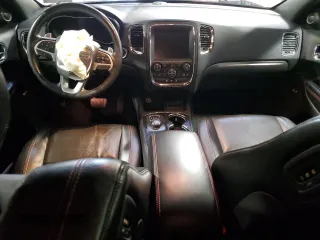 2015 Dodge Durango R/T with VIN 1C4SDHCTXFC916712, listed as a Copart auction lot 87113784 with 120,950 mi miles and Salvage Title. Bid and sale history available at DreamBid. Image 8.