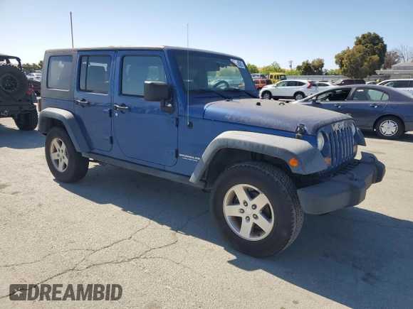 2010 Jeep Wrangler Unlimited Rubicon with VIN 1J4HA6H15AL225234, listed as a Copart auction lot 61270505 with 110,332 mi miles and Clean title. Bid and sale history available at DreamBid. Image 4.