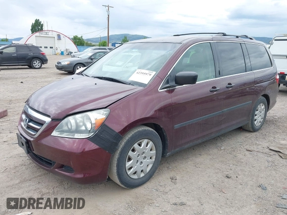 2007 Honda Odyssey LX with VIN 5FNRL38207B022095, listed as a IAAI auction lot 42395979 with 135,699 mi miles and . Bid and sale history available at DreamBid. Image 2.
