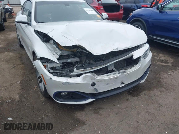 2016 BMW 4 Series 428i with VIN WBA3N7C54GK227475, listed as a IAAI auction lot 40963425 with 87,408 mi miles and . Bid and sale history available at carsss.com. Image 6.