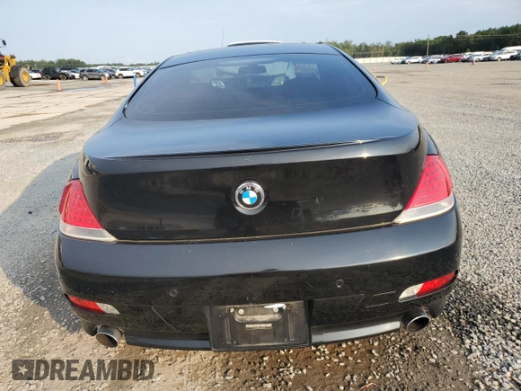 2007 BMW 6 Series 650i z VIN WBAEH13577CR52351, wystawiony jako Copart lot #72886154 z przebiegiem 77 410 mil mil oraz Szkoda całkowita • Salvage title. Historia ofert i sprzedaży dostępna na DreamBid. Obrazek 6.
