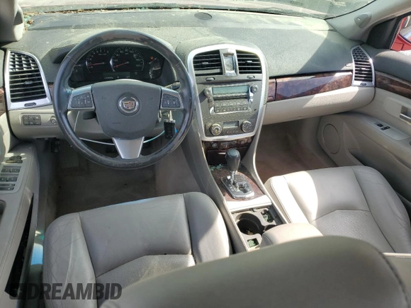 2009 Cadillac SRX RWD z VIN 1GYEE637790145952, wystawiony jako Copart lot #50309815 z przebiegiem 130 858 mil mil oraz Szkoda całkowita • Salvage title. Historia ofert i sprzedaży dostępna na DreamBid. Obrazek 8.