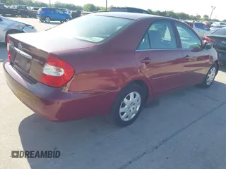 2004 Toyota Camry LE with VIN 4T1BE32KX4U272768, listed as a IAAI auction lot 42006421 with 204,386 mi miles. Bid and sale history available at carsss.com. Image 4.