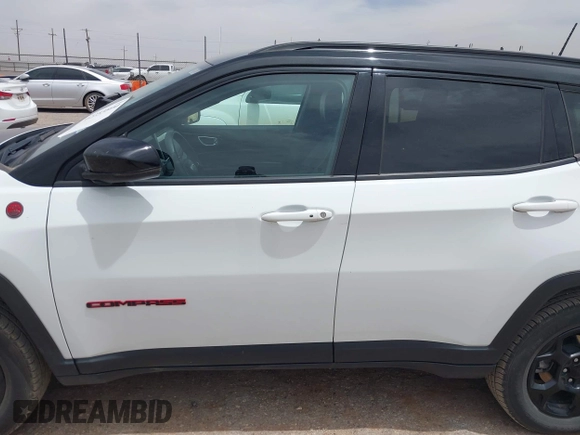 2023 Jeep Compass Trailhawk with VIN 3C4NJDDN3PT544408, listed as a IAAI auction lot 42253800 with 53,105 mi miles and . Bid and sale history available at DreamBid. Image 14.