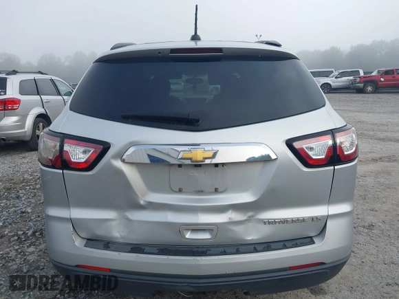 2016 Chevrolet Traverse LS z VIN 1GNKRFKD8GJ343572, wystawiony jako IAAI lot #42426571 z przebiegiem 168 568 mil mil oraz . Historia ofert i sprzedaży dostępna na DreamBid. Obrazek 16.