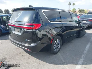2023 Chrysler Pacifica Hybrid Touring L with VIN 2C4RC1L78PR543402, listed as a IAAI auction lot 41536710 with 35,867 mi miles. Bid and sale history available at carsss.com. Image 4.