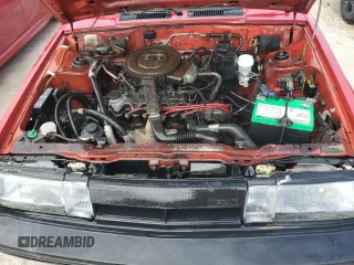 1987 Nissan Sentra z VIN JN1PB2411HU026525, wystawiony jako Copart lot #78997744 z przebiegiem 65 716 mil mil oraz Nie do naprawy. Historia ofert i sprzedaży dostępna na DreamBid. Obrazek 11.
