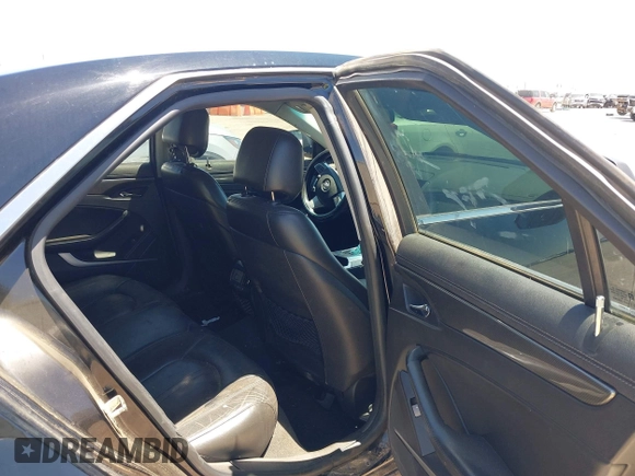 2009 Cadillac CTS RWD z VIN 1G6DU57V390157350, wystawiony jako IAAI lot #42306411 z przebiegiem 125 250 mil mil oraz . Historia ofert i sprzedaży dostępna na DreamBid. Obrazek 8.