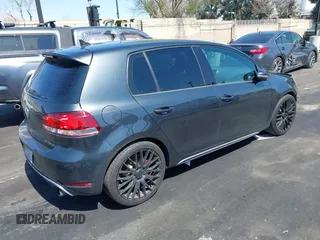 2013 Volkswagen GTI with VIN WVWGD7AJ1DW134778, listed as a IAAI auction lot 41831289 with 150,188 mi miles. Bid and sale history available at carsss.com. Image 4.