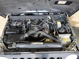 2007 Jeep Wrangler Unlimited Sahara с VIN 1J8GA591X7L217299, выставлен на аукционе Copart как лот 61984395 с пробегом 151 171 миль миль и Списание • Salvage title. История ставок и продаж доступна на DreamBid. Изображение 11.