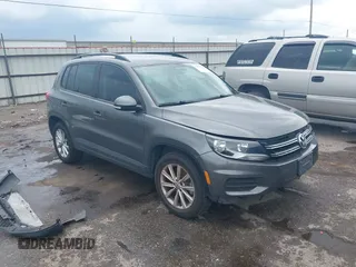 2015 Volkswagen Tiguan SEL with VIN WVGAV7AX7FW507117, listed as a IAAI auction lot 42416956 with 164,966 mi miles and . Bid and sale history available at DreamBid. Image 1.