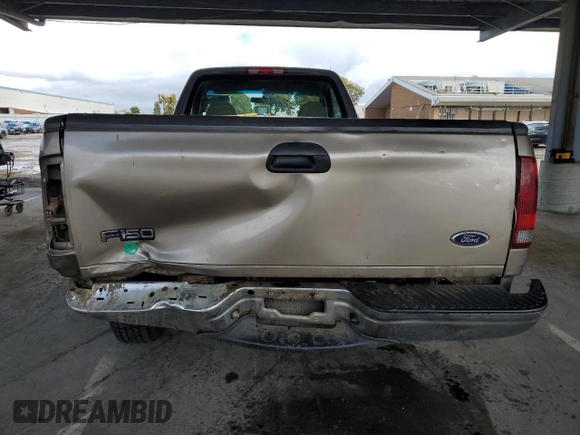 2002 Ford F-150 XL with VIN 1FTRF17W62NB40159, listed as a Copart auction lot 49010765 with 166,719 mi miles and Salvage Title. Bid and sale history available at carsss.com. Image 6.