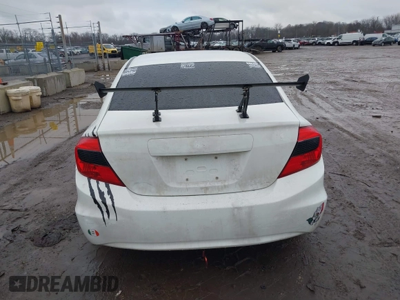 2012 Honda Civic EX-L with VIN 2HGFB2F95CH529693, listed as a IAAI auction lot 41160120 with 194,418 mi miles and . Bid and sale history available at DreamBid. Image 16.