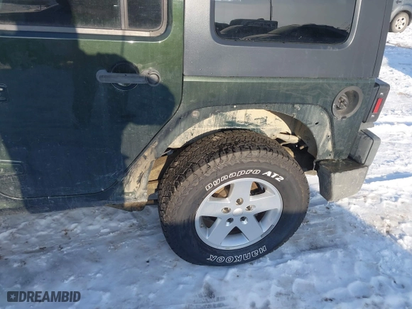 2010 Jeep Wrangler Unlimited Sport with VIN 1J4BA3H12AL127802, listed as a IAAI auction lot 41237029 with 94,320 mi miles. Bid and sale history available at carsss.com. Image 6.