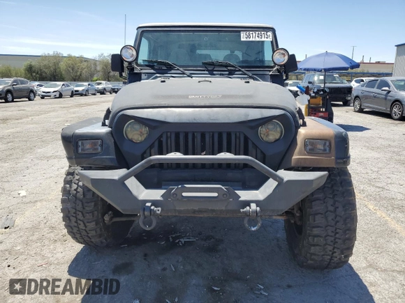 1999 Jeep Wrangler Sahara with VIN 1J4FY49S8XP472733, listed as a Copart auction lot 58174915 with 170,838 mi miles and Salvage title. Bid and sale history available at DreamBid. Image 5.