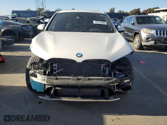 2021 BMW X1 xDrive28i with VIN WBXJG9C09M5S71263, listed as a Copart auction lot 46374565 with 61,537 mi miles and Salvage Title. Bid and sale history available at carsss.com. Image 5.