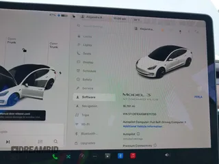 2021 Tesla Model 3 Standard Range Plus z VIN 5YJ3E1EAXMF871730, wystawiony jako IAAI lot #41794274 z przebiegiem 18 791 mil mil oraz . Historia ofert i sprzedaży dostępna na DreamBid. Obrazek 7.