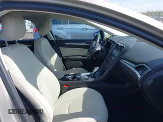 2016 Ford Fusion Titanium Hybrid with VIN 3FA6P0RU5GR171287, listed as a IAAI auction lot 41918195 with 74,721 mi miles. Bid and sale history available at carsss.com. Image 5.