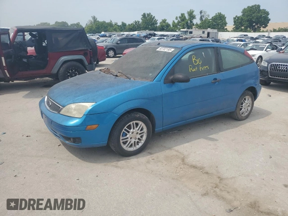 2007 Ford Focus S z VIN 1FAFP31N77W138844, wystawiony jako Copart lot #60702195 z przebiegiem Nie podano mil oraz Czysty tytuł • Clean title. Historia ofert i sprzedaży dostępna na DreamBid. Obrazek 1.