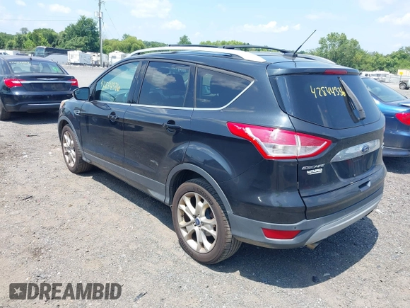 2015 Ford Escape Titanium with VIN 1FMCU9J96FUC01790, listed as a IAAI auction lot 42844336 with 133,005 mi miles and . Bid and sale history available at DreamBid. Image 3.