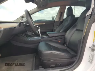 2021 Tesla Model 3 Standard Range Plus with VIN 5YJ3E1EA2MF985463, listed as a Copart auction lot 53311455 with 23,176 mi miles and Clean Title. Bid and sale history available at DreamBid. Image 7.