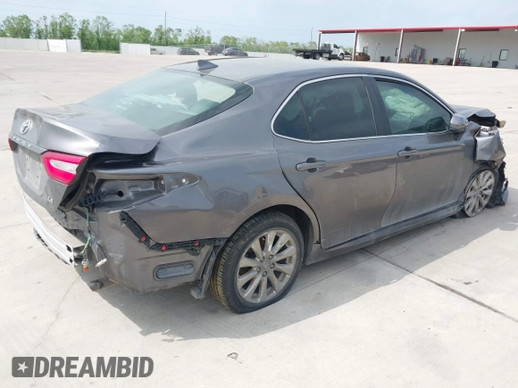 2020 Toyota Camry LE with VIN 4T1C11AK1LU505201, listed as a IAAI auction lot 42006393 with 106,526 mi miles and . Bid and sale history available at carsss.com. Image 4.