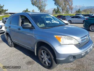 2007 Honda CR-V EX with VIN JHLRE38567C044218, listed as a IAAI auction lot 41960696 with 188,548 mi miles. Bid and sale history available at carsss.com. Image 1.