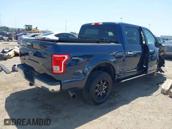 2015 Ford F-150 XL with VIN 1FTEW1CG9FKE02714, listed as a IAAI auction lot 42006913 with 151,809 mi miles. Bid and sale history available at carsss.com. Image 4.