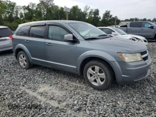 2009 Dodge Journey SXT with VIN 3D4GG57V59T582639, listed as a Copart auction lot 54008275 with 185,017 mi miles and Clean Title. Bid and sale history available at carsss.com. Image 4.