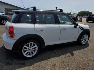 2014 MINI Countryman S z VIN WMWZC5C51EWP35221, wystawiony jako Copart lot #58718545 z przebiegiem 152 809 mil mil oraz Tytuł czysty. Historia ofert i sprzedaży dostępna na DreamBid. Obrazek 3.