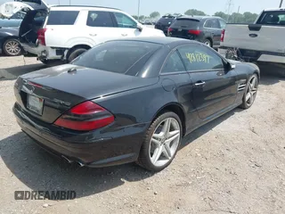 2005 Mercedes-Benz SL 55 AMG with VIN WDBSK74F85F101039, listed as a IAAI auction lot 42812397 with 76,452 mi miles and . Bid and sale history available at DreamBid. Image 4.