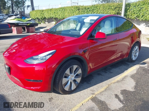 2020 Tesla Model Y Long Range with VIN 5YJYGDEE8LF057014, listed as a IAAI auction lot 41988113 with 18,246 mi miles and . Bid and sale history available at DreamBid. Image 20.