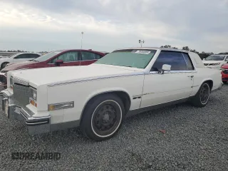 1982 Cadillac Eldorado z VIN 1G6AL5788CE619329, wystawiony jako Copart lot #78050004 z przebiegiem 88 385 mil mil oraz Nie do naprawy. Historia ofert i sprzedaży dostępna na DreamBid. Obrazek 1.