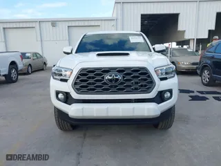 2023 Toyota Tacoma 4WD SR with VIN 3TMCZ5AN9PM566739, listed as a IAAI auction lot 41513763 with 16,708 mi miles. Bid and sale history available at carsss.com. Image 13.